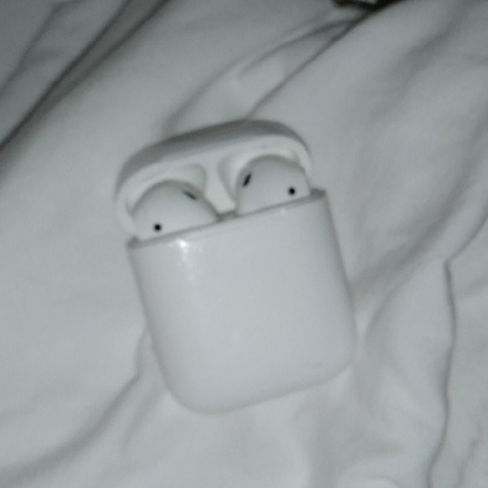 2 sets of apple airpods with charging kit